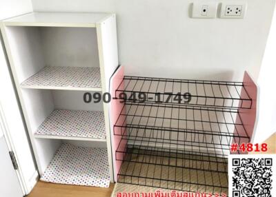 Empty room with shelf and pet crate