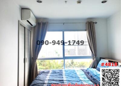 Cozy bedroom with a view and modern air conditioning unit
