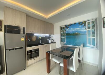 Modern kitchen with high-end appliances and a scenic view