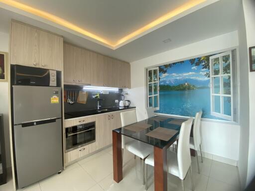 Modern kitchen with high-end appliances and a scenic view