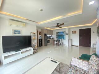 Spacious living room with modern furnishings and open layout