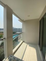 Bright and spacious balcony with a view of the pool