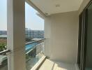 Bright and spacious balcony with a view of the pool