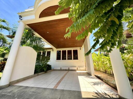 Bright and spacious covered patio with wooden ceiling