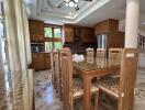 Spacious kitchen with wooden cabinets and dining area