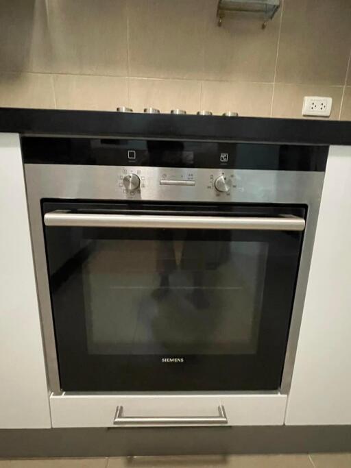 Modern built-in Siemens oven in a clean kitchen setting