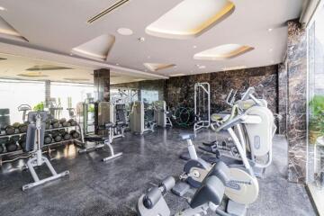 Modern home gym with various exercise equipment