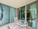 Cozy patio area with outdoor furniture and sliding glass doors