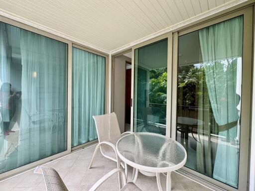 Cozy patio area with outdoor furniture and sliding glass doors