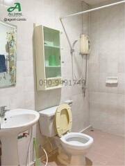 Compact bathroom with basic amenities