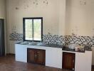 Modern kitchen with wooden cabinets and tiled backsplash