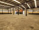 Spacious empty interior of a large industrial building with high ceiling