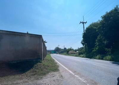 Exterior view of road leading to the property with clear skies