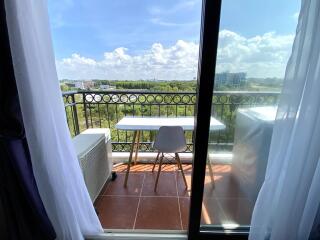 Spacious balcony with a view and outdoor seating area