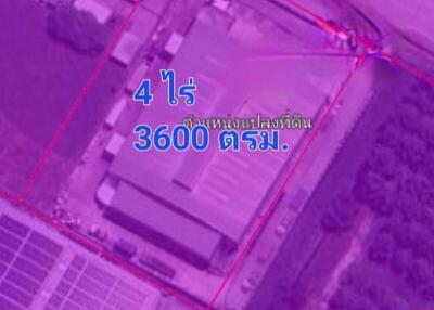 Infrared satellite imagery of a property with overlaid text