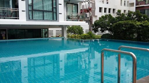 Residential building with outdoor swimming pool and modern design