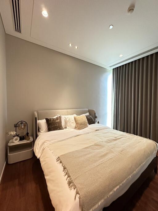 Modern bedroom with double bed and stylish decor