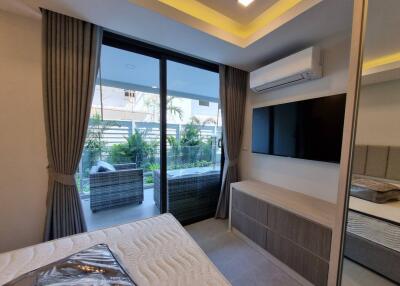 Modern bedroom with direct access to balcony