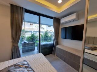 Modern bedroom with direct access to balcony