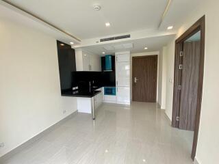 Modern kitchen with tiled flooring and wooden accents