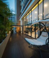 Cozy balcony with modern furniture and ambient lighting