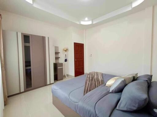 Modern Bedroom with Cozy Bedding and Elegant Design