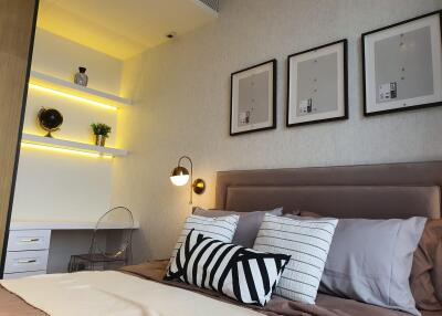 Modern bedroom interior with decorated wall and cozy lighting