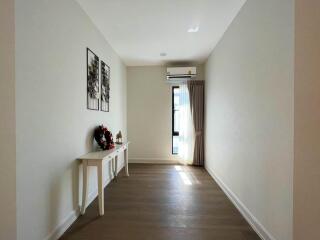 Bright and Spacious Hallway with Modern Decor