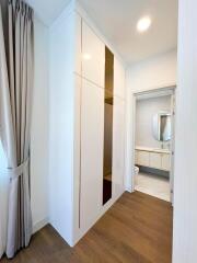 Bright modern bedroom with large mirror closet doors