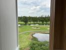 Scenic view of a golf course from a property window