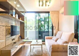 Modern living room with natural light and garden view