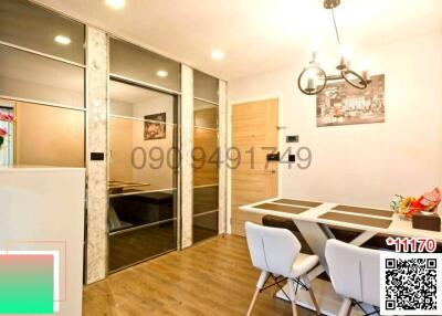 Modern kitchen with dining area and glass partition