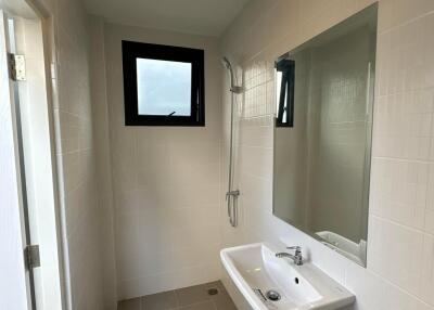 Modern Bathroom Interior with White Tiles