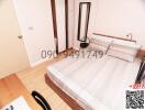 Cozy bedroom with double bed and wooden floor