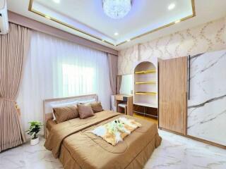 Elegant bedroom with a large bed and sophisticated interior design