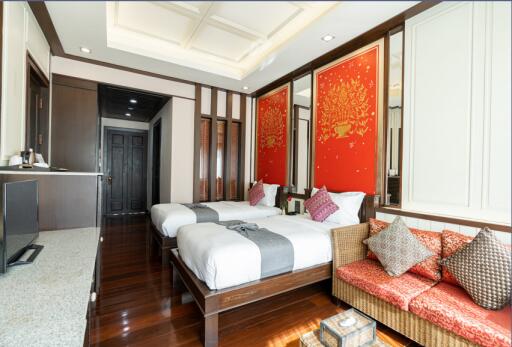 Elegant bedroom with traditional design elements and en-suite facilities