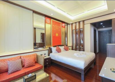 Elegant bedroom with warm lighting and tasteful decor