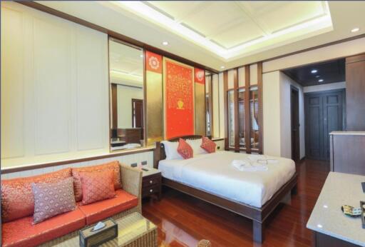 Elegant bedroom with warm lighting and tasteful decor