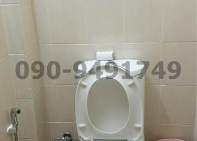 Clean and well-maintained bathroom interior with toilet