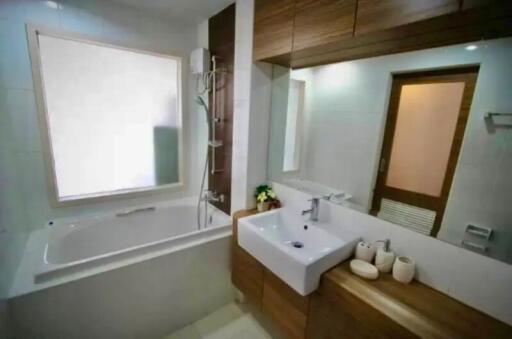 Modern bathroom interior with bathtub and shower