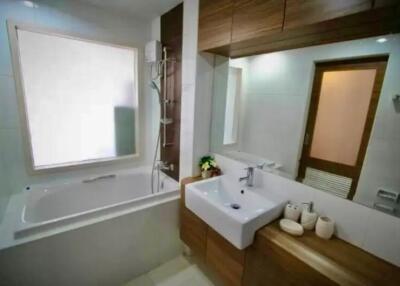 Modern bathroom interior with bathtub and shower