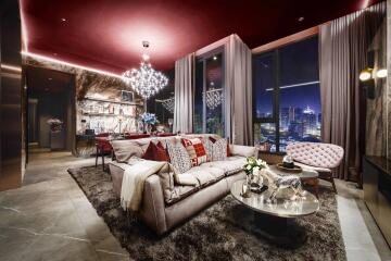 Stylish living room with modern decor, red ceiling, and city view