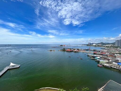 Panoramic seaside view from property showing ocean, sky, and coastal town