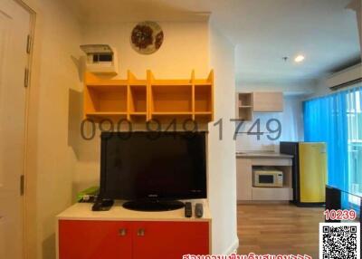 Contemporary living room with integrated kitchen space