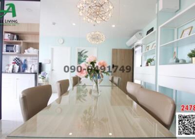 Spacious dining area with modern furniture and decor