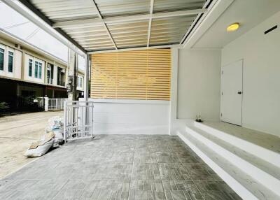 Bright and modern patio area with tiled flooring and ample space