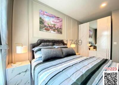 Cozy bedroom with a double bed and wall art