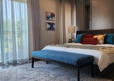 Elegant bedroom with modern design and ample natural light
