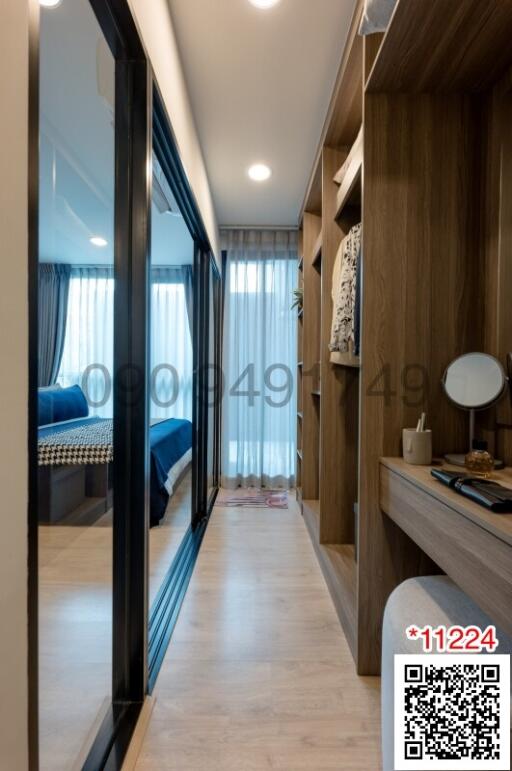 Modern bedroom interior with wooden wardrobe and large window