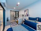 Modern bedroom with blue tones and artistic decor